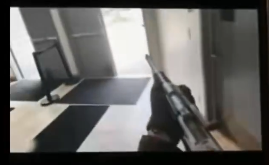 Screenshot of from the shooter livestream obtained by KPBS showing the Ruger Mini-14 rifle in the lobby of the Islamic Center of San Diego.