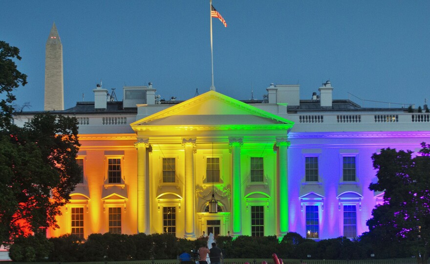 In celebrating the 2015 Supreme Court's ruling to legalize same-sex marriage, the White House lit-up with the iconic color scheme of Baker's flag.