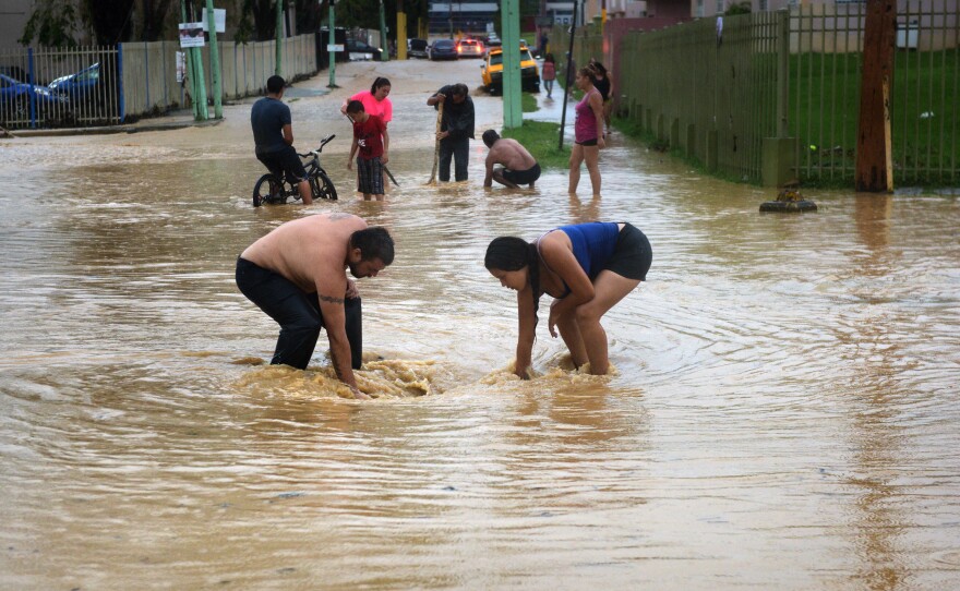 Continued flooding brings more suffering to neighborhoods of Utuado after Hurricane Maria devastated Puerto Rico.