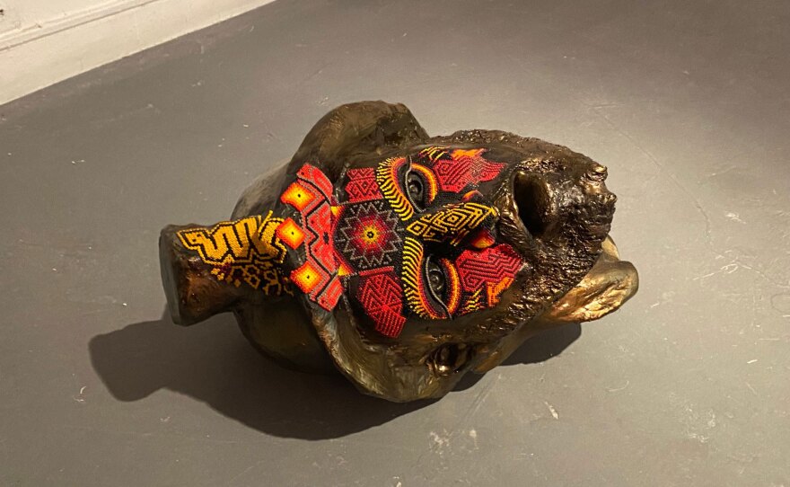 "Tio," by Carlos Castro, is a fragment of a Gonzalo Jiminez de Quesada sculpture covered with indigenous Inga beadwork.