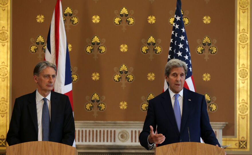 British Foreign Secretary Philip Hammond (left) and U.S. Secretary of State John Kerry hold a joint press conference after meeting in London on Monday. The U.S. "could not ask for a better friend and ally," Kerry said.