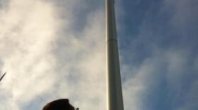 Awaiting the Supreme Court decisions on Proposition 8 and the Defense Of Marriage Act, John Shaw looks at a rainbow flag flying atop a flagpole in Hillcrest, June 26, 2013. 