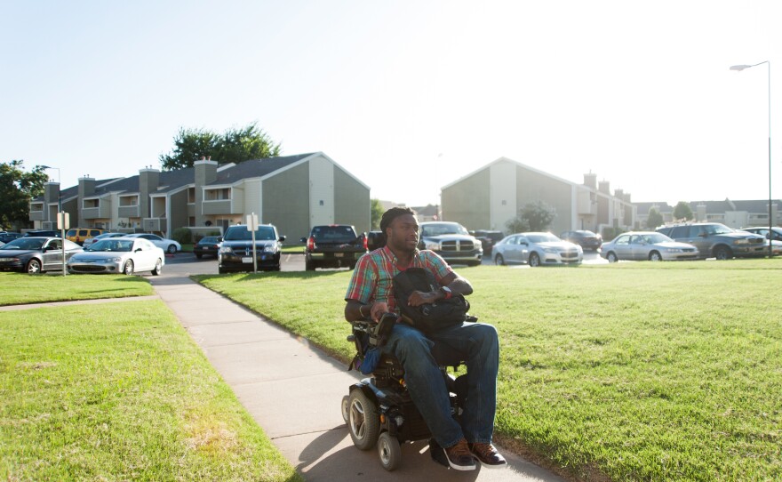 Nnaka arrives home to his apartment in South Tulsa after a long day.