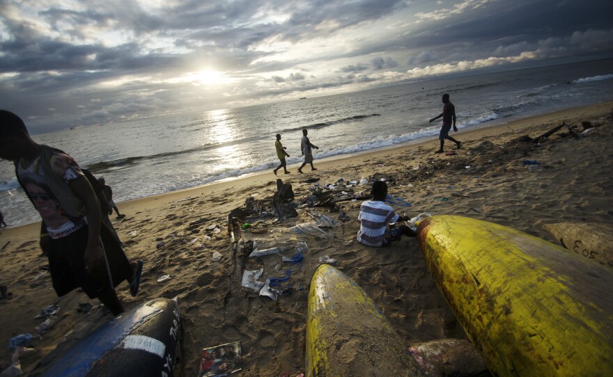 The colorful canoes are used by West Point fishermen.