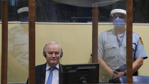 Former Bosnian Serb military chief Ratko Mladic sits in the court room in The Hague, Netherlands, June 8, 2021, where the United Nations court delivers its verdict in the appeal of Mladic against his convictions for genocide and other crimes and his life sentence for masterminding atrocities throughout the Bosnian war.