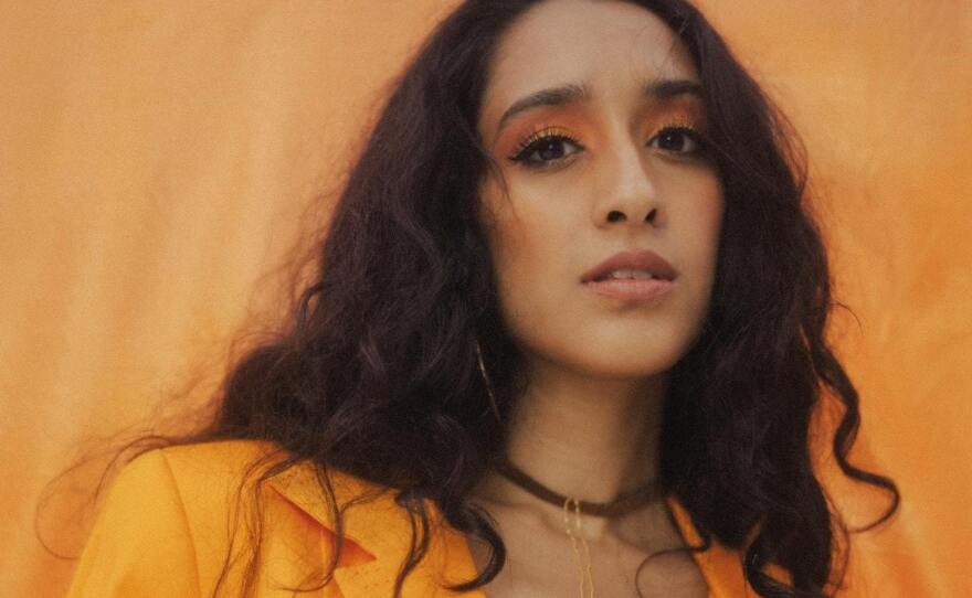 R&B singer Raveena. Her new album, <em>Lucid, </em>is on our shortlist of the best new albums out on May 31.