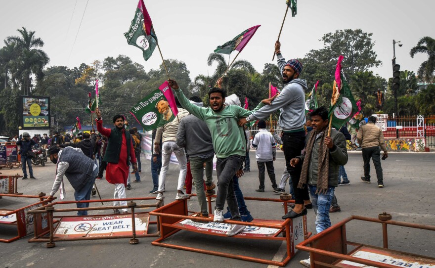 Activists from the All India Students Association and other groups protest in Patna during a statewide strike on Jan. 28 over the ramping up of qualifications for railway jobs.