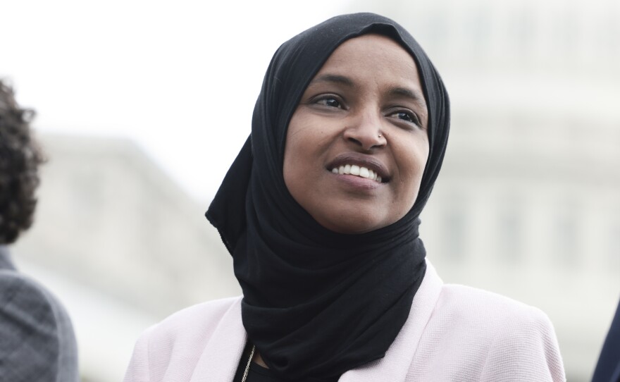 Rep. Ilhan Omar, D-Minn., listens during a news conference on Sept. 22.