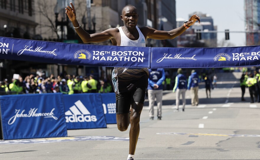 Evans Chebet, of Kenya, hits the finish line to win the 126th Boston Marathon on Monday.