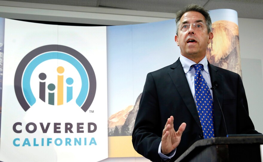 In this Nov. 13, 2013, file photo, Peter Lee, executive director of Covered California, the state's health insurance exchange, talks at a news conference in Sacramento, Calif.