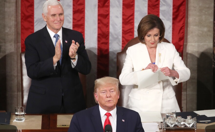 House Speaker Nancy Pelosi rips up pages of the State of the Union speech after President Donald Trump finishes his address on Feb. 4, 2020. The following day, the Senate acquitted Trump in his first impeachment trial.