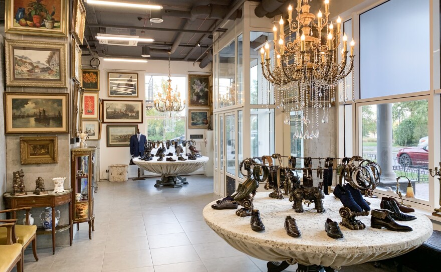 The Zlocci shop features collections of flashy men's shoes made from crocodile and caiman skins arranged on two polished marble tables. I<strong></strong>n 2015, investigative reporters<strong> </strong>traced the ownership of the business to Zlochevsky.