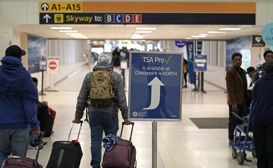 Passengers head for security screening at George Bush Intercontinental Airport in Houston last year.