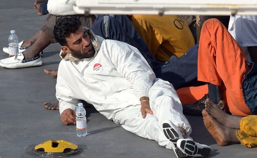 Tunisian national Mohammed Ali Malek, one of the survivors and understood to be the captain of the boat that overturned off the coast of Libya, sits on board the Italian Coast Guard vessel Bruno Gregoretti after he was rescued in April 2015.