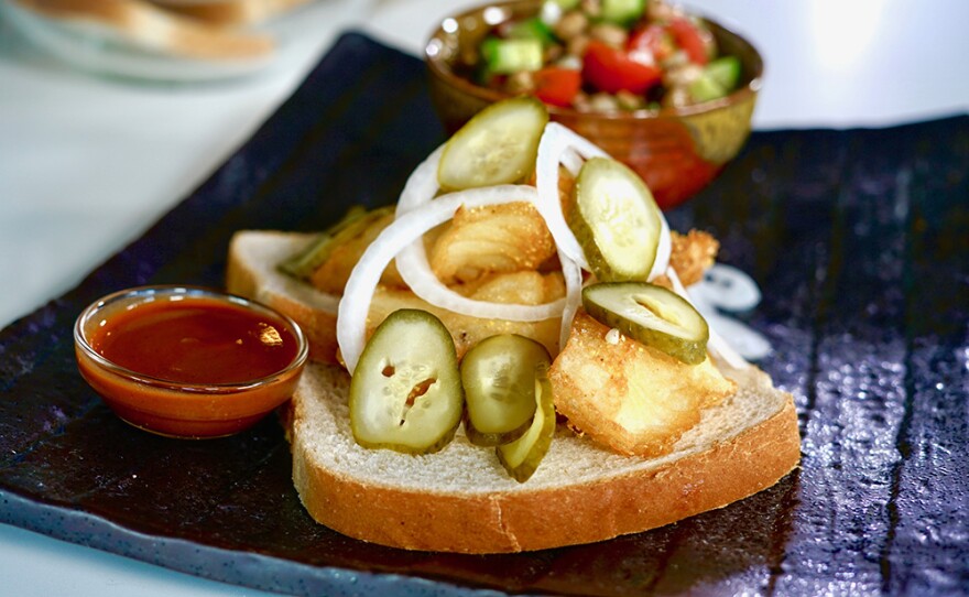 Chef Carla Hall cooks up a childhood favorite: Fried Fish Southern Style with Black-Eyed Pea Salad and a Hot Sauce Vinaigrette.