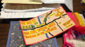 A handmade card shows opposition to nuclear waste traveling along New Mexico highways to the Waste Isolation Pilot Plant in Carlsbad, N.M.
