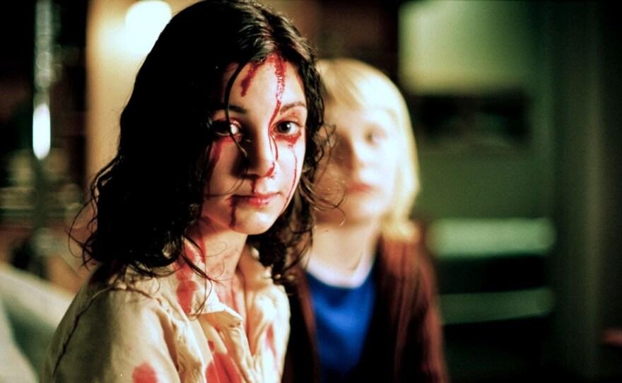 For Day 23, check out the vampire tale "Let the Right One In" in which we discover that a young girl turns out to be an old vampire on the prowl for a new human companion.