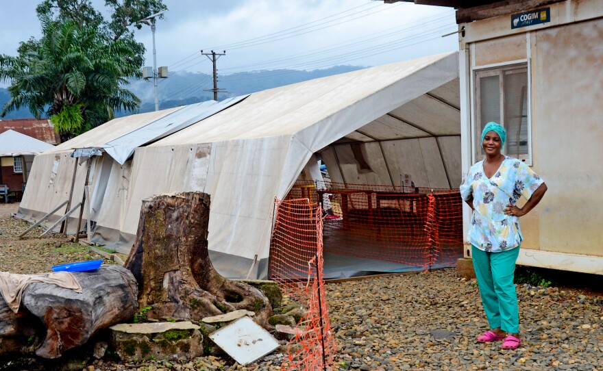 Nurse Isata Kallon outside of the triage tent.