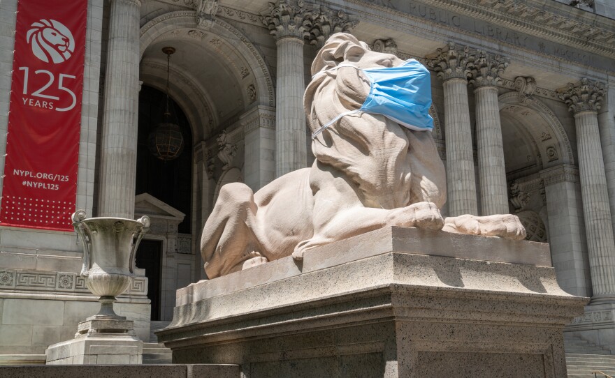 The marble lions outside the New York Public Library in midtown Manhattan are wearing face masks to remind New Yorkers to follow COVID-19 safety guidelines. Throughout their 109-year history the sculptures have worn baseball caps, top hats and wreaths.