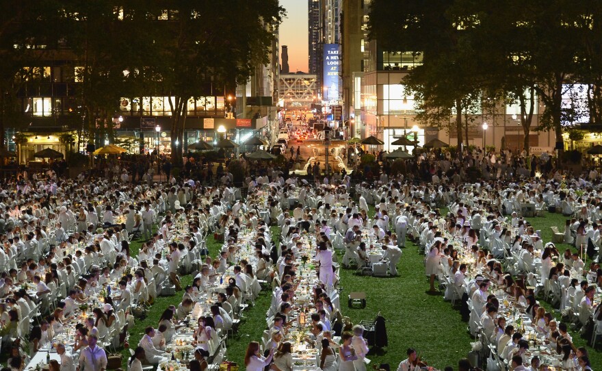 Thousands gathered for the 2013 Diner en Blanc in New York City this week. This year marks the 25th anniversary of the pop-up dinner event, which began in Paris.