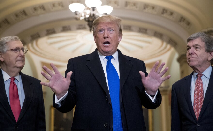 President Trump speaks to reporters as he arrives for a Senate Republican lunch on Capitol Hill on Tuesday.