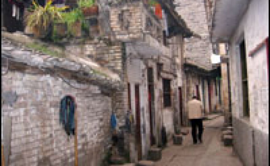 The last old alleyways of Kaixian, an ancient county town on the Three Gorges reservoir, await demolition as residents move to a new town farther uphill.