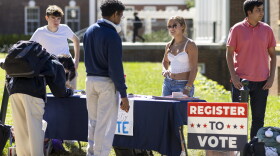 Students at the University of Virginia help eligible voters register to vote in Charlottesville, Va., in 2024.