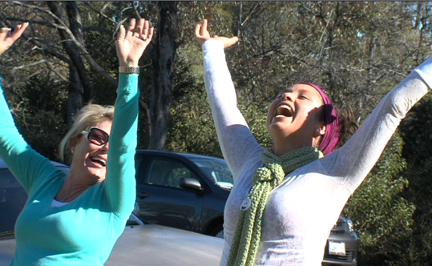 Laughter yoga participants in Balboa Park.