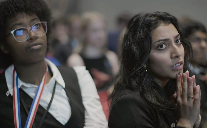 Rohini Mudinur and Avery Redmond, students at Maggie L. Walker Governor’s School in Richmond, Va., anxiously awaited the results at a We the People competition. (Leesburg, Va.)
