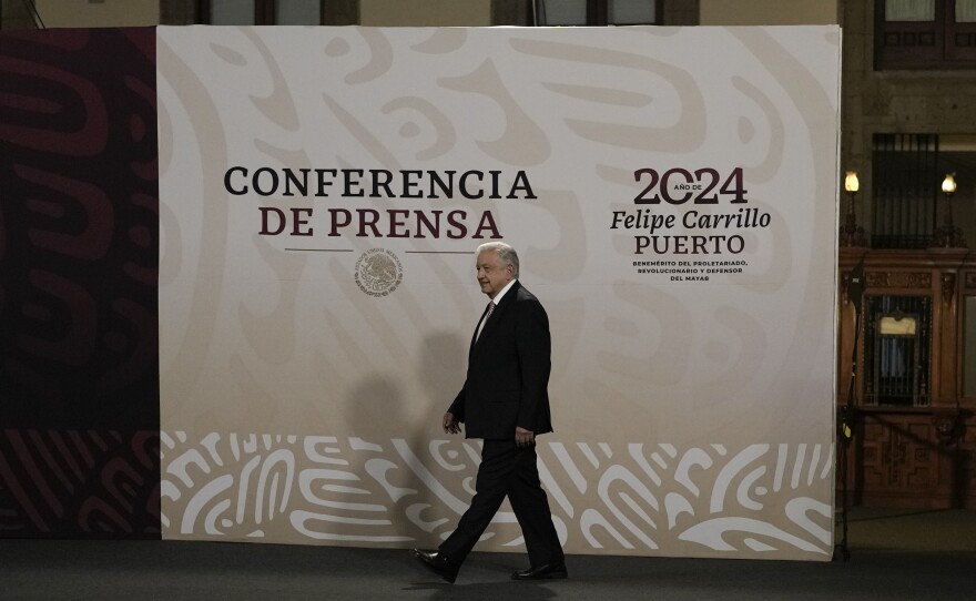 FILE - Mexican President Andres Manuel Lopez Obrador arrives to start his daily, morning press conference at the National Palace in Mexico City, March 1, 2024. Lopez Obrador commented on the country's first presidential debate ahead of the June election, expressing anger on Tuesday, April 9, 2024, that debate moderators posed questions about corruption and problems with the education and healthcare systems, issues he says he has resolved. (AP Photo/Marco Ugarte, File)