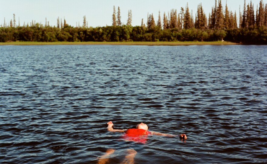 Julia Elaine swims on a hot day in Aklavik.
