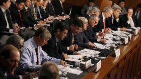 Members of Congress participate in a Joint Deficit Reduction Committee hearing October 26, 2011 in Washington, DC. The special Joint Committee is tasked with finding $1.5 trillion in deficit reduction by Thanksgiving.