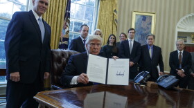 President Trump, accompanied by Vice President Pence and staff, signed multiple documents regarding two major oil pipelines in the U.S.