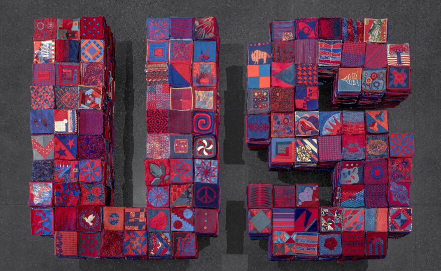 In January 2020, Arizona artist Ann Morton put out a call on social media asking people to create 8 inch by 8 inch textile squares that use equal parts red and blue. The squares and the project as a whole stands for a set of values: respect for the other, citizenship, compromise, country over party and corporate influence, and creativity.