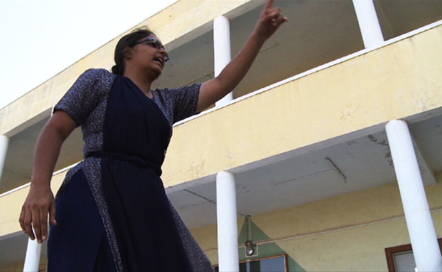 Camp leader Prachi addresses a group of girls.
