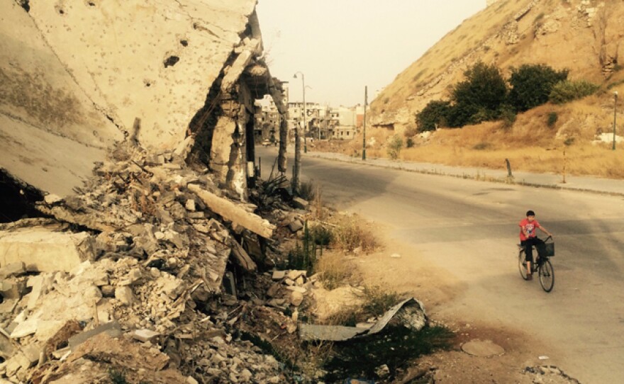 Correspondent Martin Smith goes inside Syria to report from government-controlled areas as war rages and the refugee crisis continues. This photo of Old Homs shows the devastation of the civil war and the Assad regime’s siege.