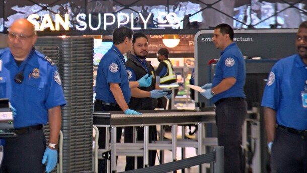 A group of TSA agents are shown in Terminal 1 at San Diego International Airport on Oct. 21, 2025.