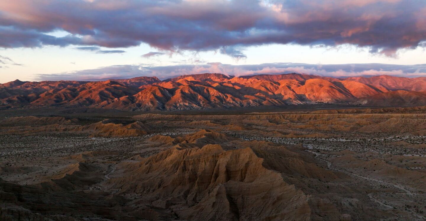 In a still from "America's Wildest City," the first light of day shines on the mountains surrounding Anza in San Diego County.