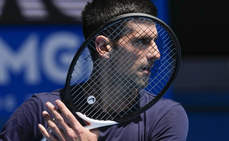 Defending men's champion Novak Djokovic practices ahead of the Australian Open tennis championship in Melbourne, Australia, on Wednesday.