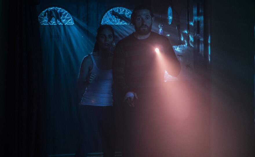 Caitlin Stasey and Lucas Neff play a young couple who get more than they bargained for in "Fear, Inc."