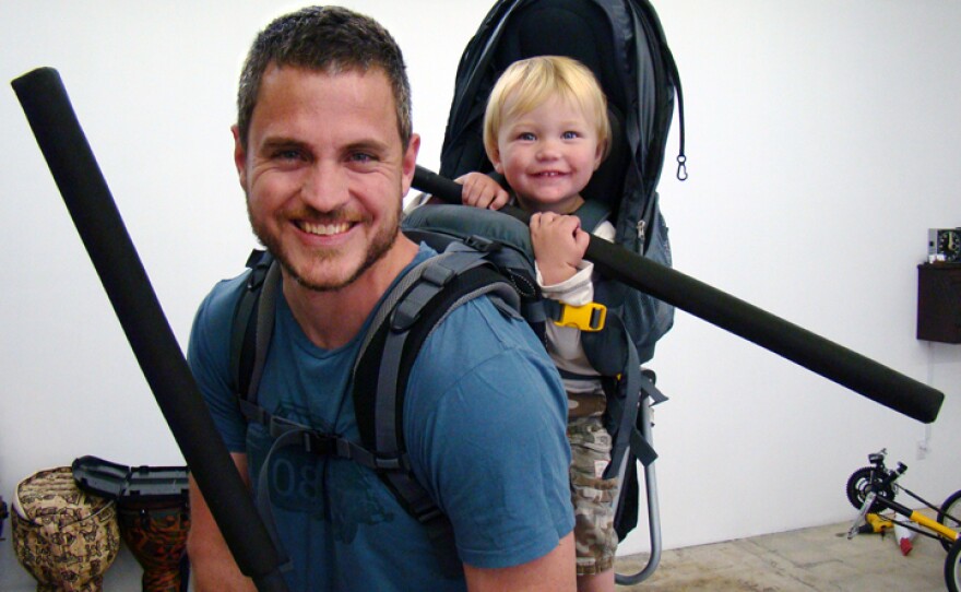 Sam Sheridan, shown here with his son Asa, is an amateur boxer and MMA fighter. He has worked in construction in Antarctica and as a cowboy and farmhand in Montana.