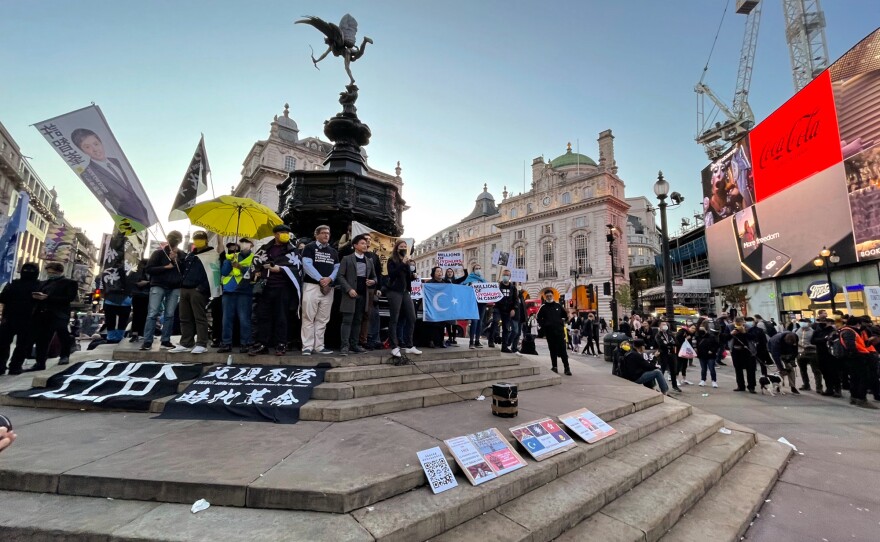 Hundreds fill London's Piccadilly Circus on Oct. 1, China's National Day, to protest the Chinese Communist Party's treatment of Hong Kong, Tibet and the Uyghurs in Xinjiang.