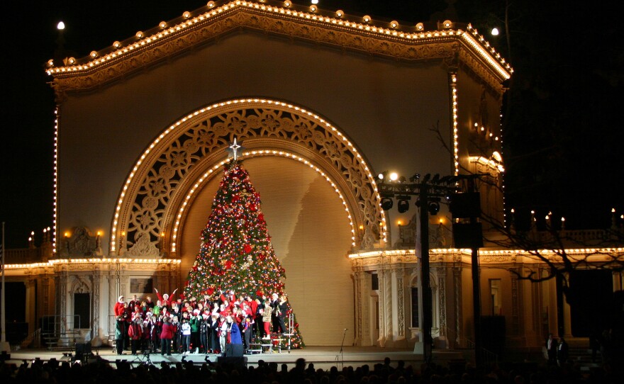 Performers are shown in front of the Christmas Tree at the Organ Pavilion in Balboa Park in an undated photo during December Nights.