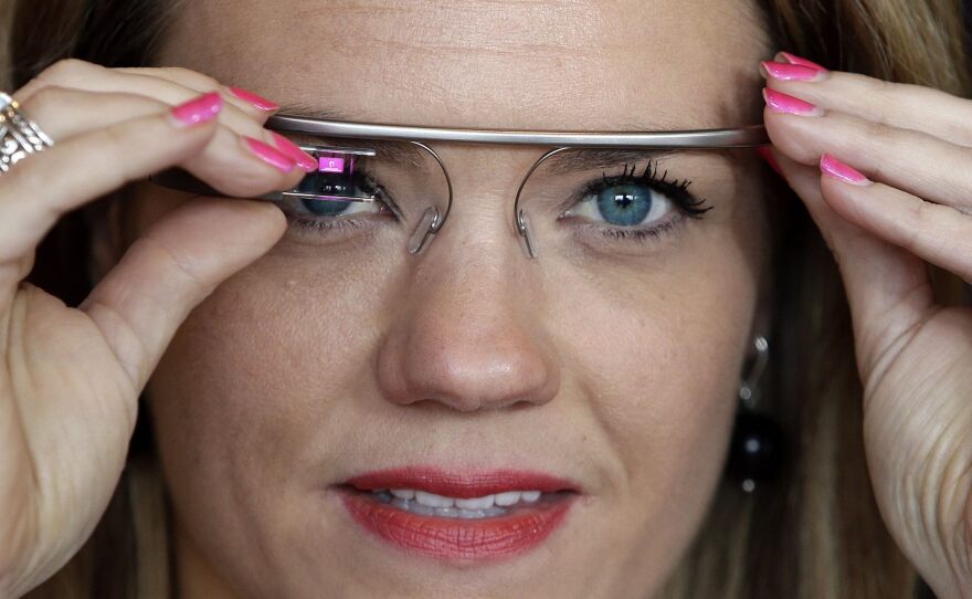 Sarah Hill, a Google Glass explorer, tries out her device in May.