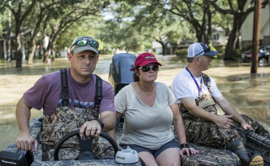 Hinkie takes the McKnights to their flooded home to get personal items. "What caught me by surprise was that I was bringing people to their homes for the first time," Hinkie said. "They finally see what they had known, but had not yet seen it with their own eyes."