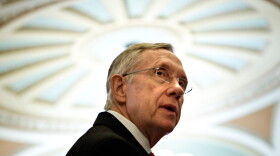 Senate Majority Leader Harry Reid (D-NV) waits to speak to reporters after a meeting with President Barack Obama and other Senate Democrats on Capitol Hill December 6, 2009 in Washington, D.C.
