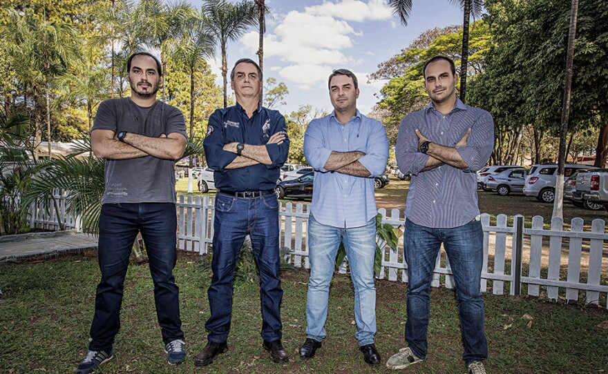 Jair Bolsonaro with his children Eduardo Bolsonaro, Flávio Bolsonaro, Carlos Bolsonaro, during a visit to the Peao de Barretos party