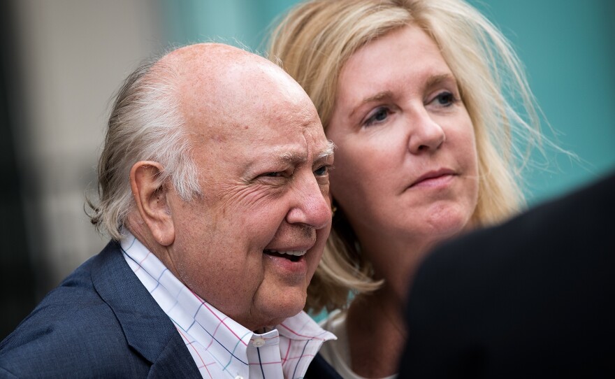 Fox News CEO and Chairman Roger Ailes and his wife, Elizabeth Tilson, leave the News Corp. building in New York on Tuesday. Ailes is stepping down from his role and Rupert Murdoch will be taking over as chairman and acting CEO.