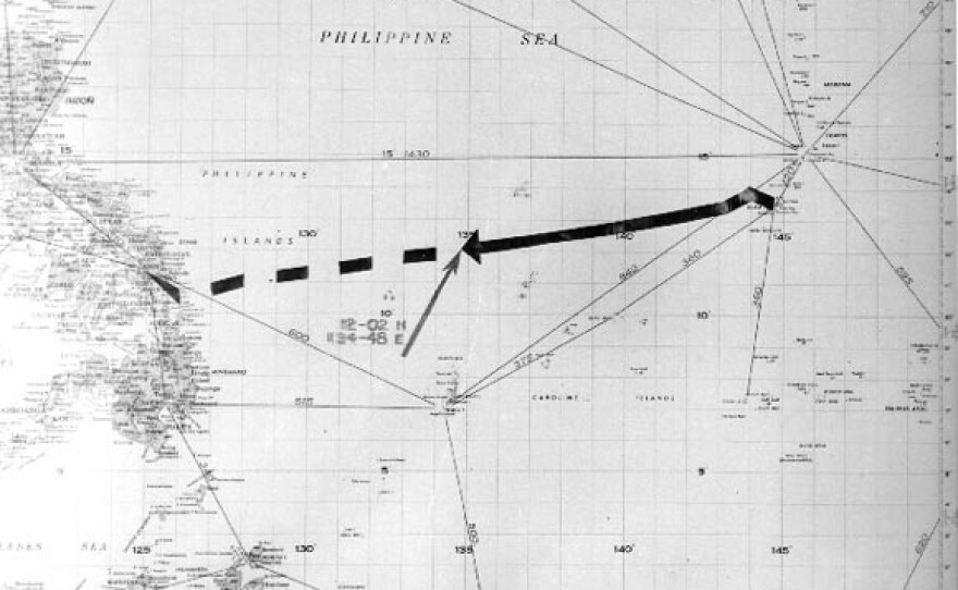 A chart of the western Pacific that shows the Indianapolis' path from Guam to her reported sinking location, with a dashed line to indicate the intended route to the Philippines.