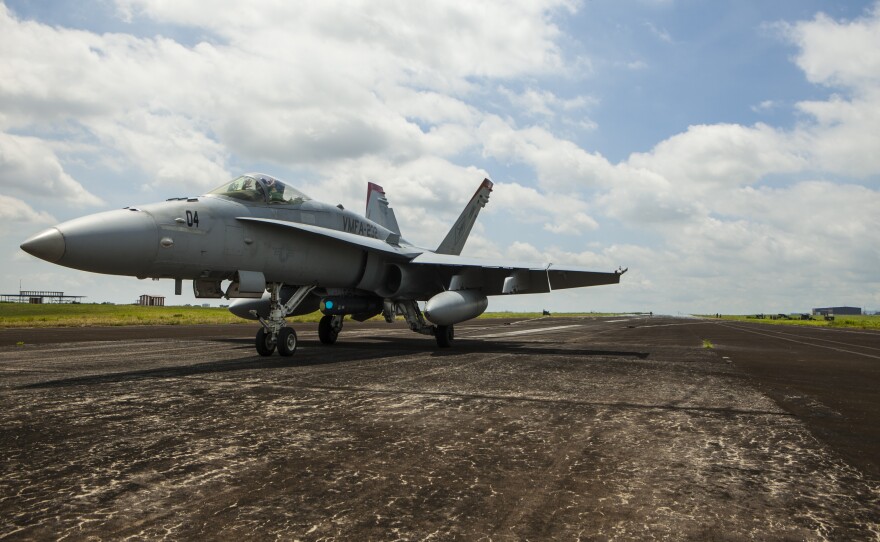 A U.S. Marine Corps F-A-18C Hornet aircraft assigned to Marine Fighter Attack Squadron 232 comes to a stop during an exercise in the Philippines, Oct. 2, 2013.